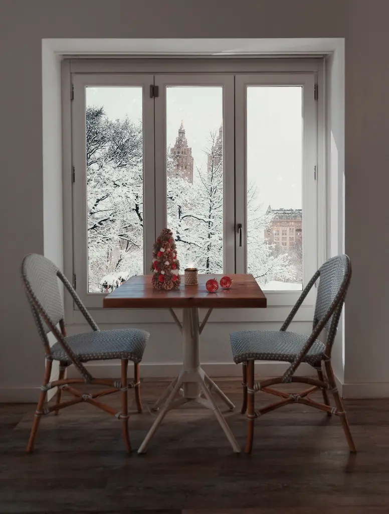 snowy-window-with-christmas-interior-dec.webp