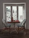 snowy-window-with-christmas-interior-dec.webp